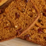 Sliced pumpkin cranberry bread.